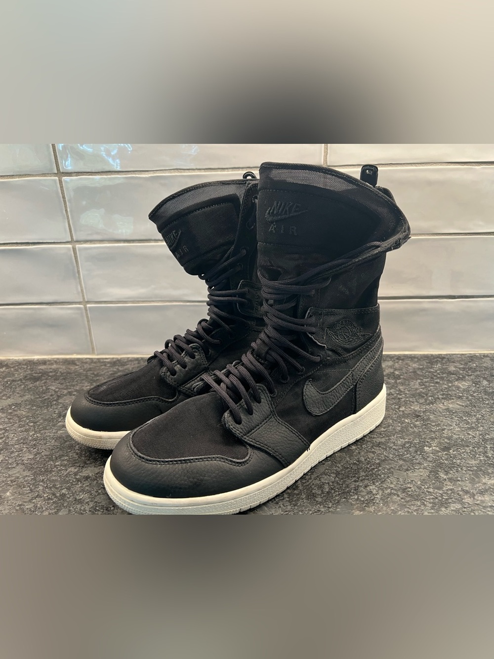 Nike Black High-Top Athletic Boots with White Sole